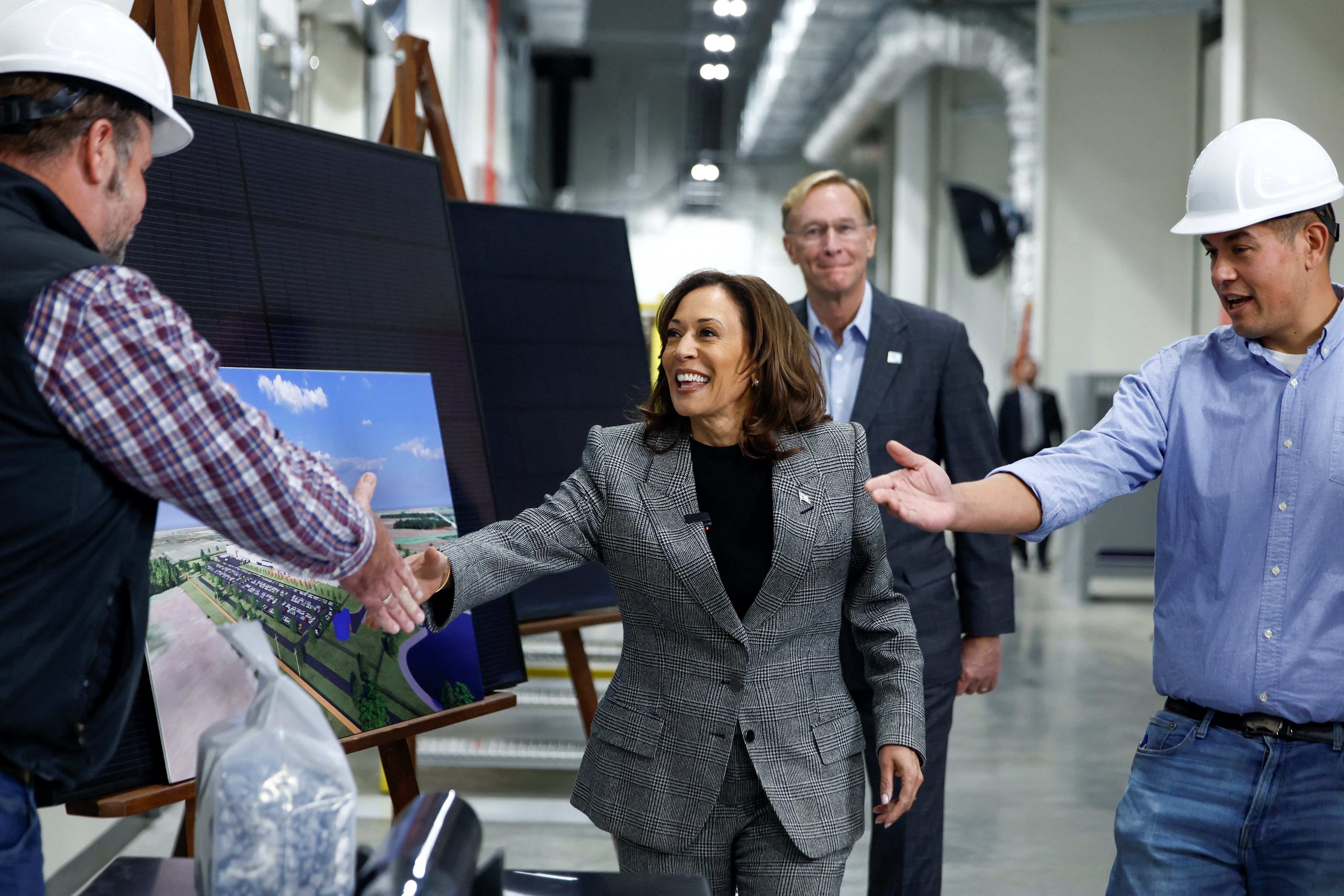 ​Democratic presidential nominee U.S. Vice President Kamala Harris meets employees as she visits Hemlock Semiconductor in Hemlock, during her campaign trip to Michigan, U.S., October 28, 2024. 