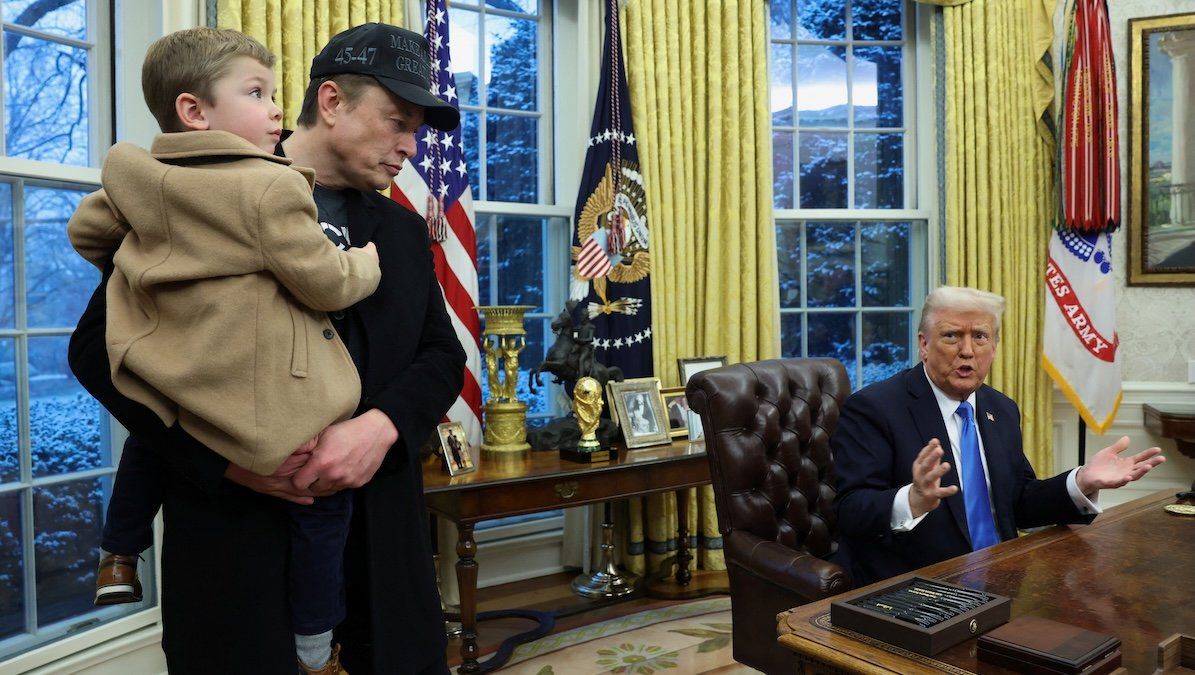 ​Elon Musk carries X Æ A-12 as President Donald Trump speaks in the Oval Office of the White House in Washington, D.C., on Feb. 11, 2025. 