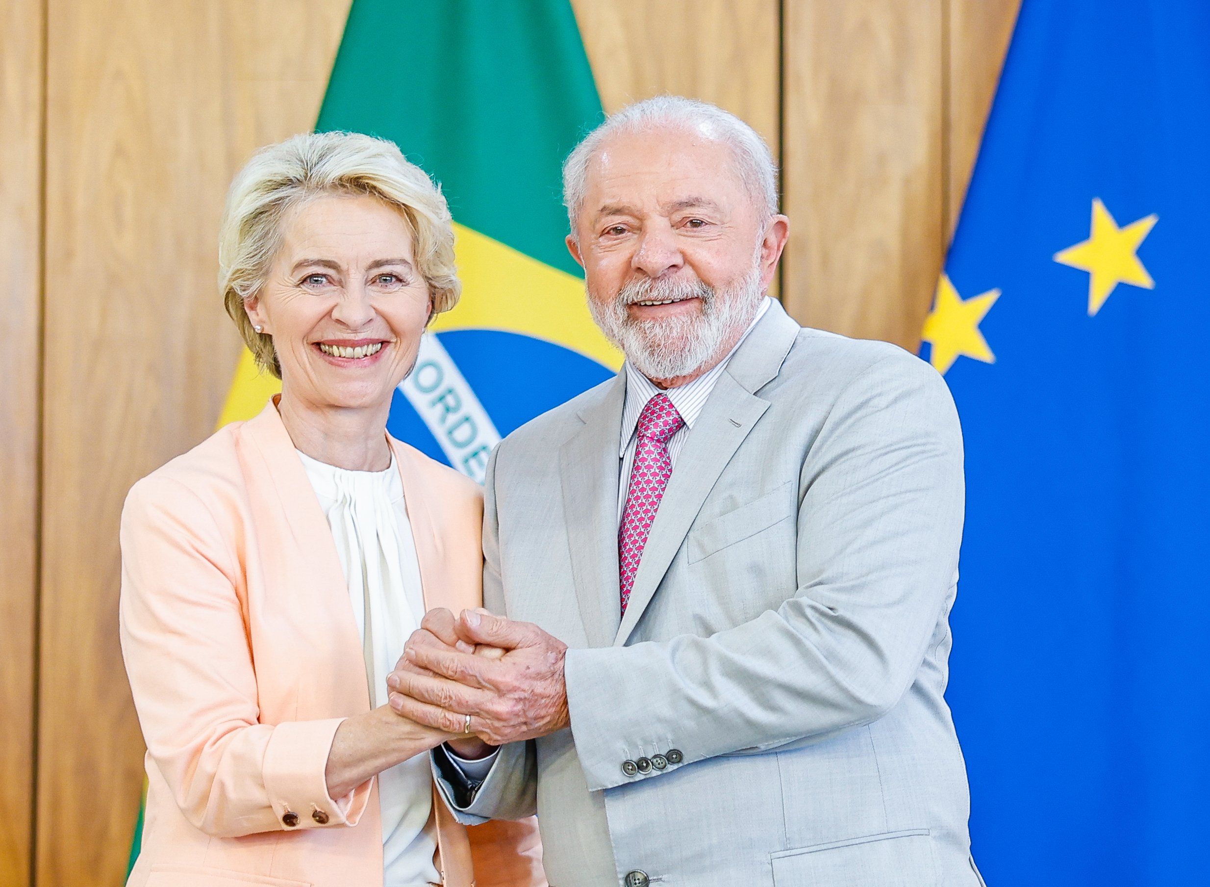 EU Commission chief Ursula von der Leyen shakes hands with Brazil's President Lula da Silva in Brasilia.