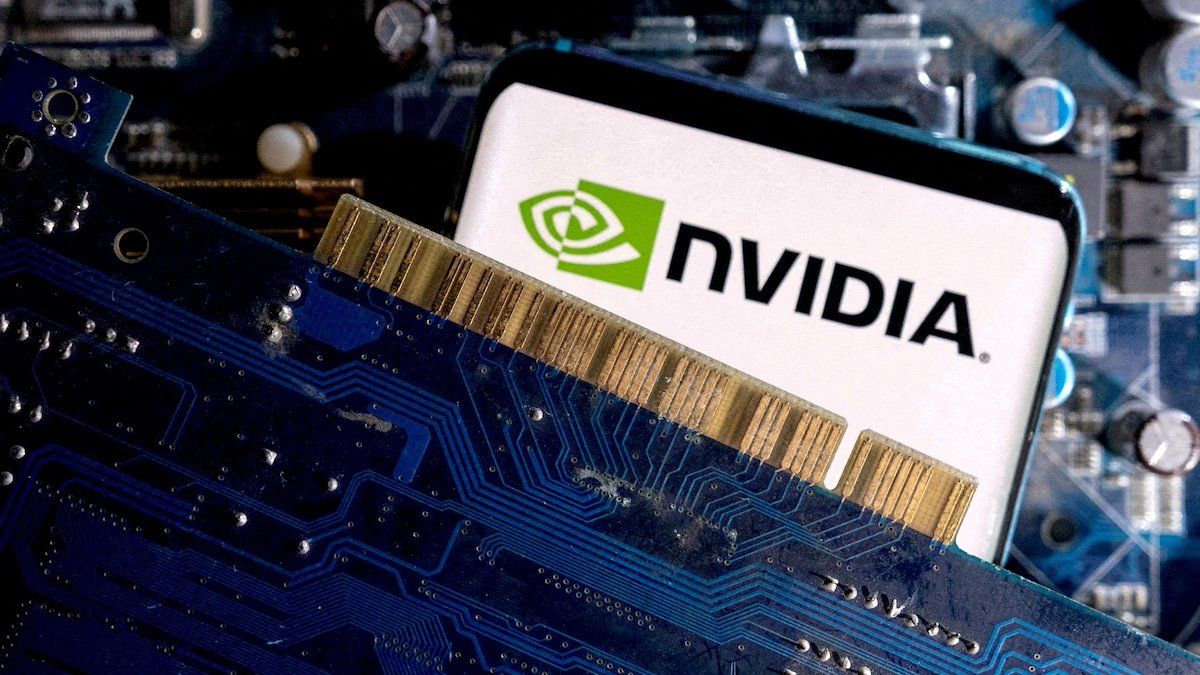 ​FILE PHOTO: A smartphone with a displayed NVIDIA logo is placed on a computer motherboard in this illustration taken March 6, 2023. 