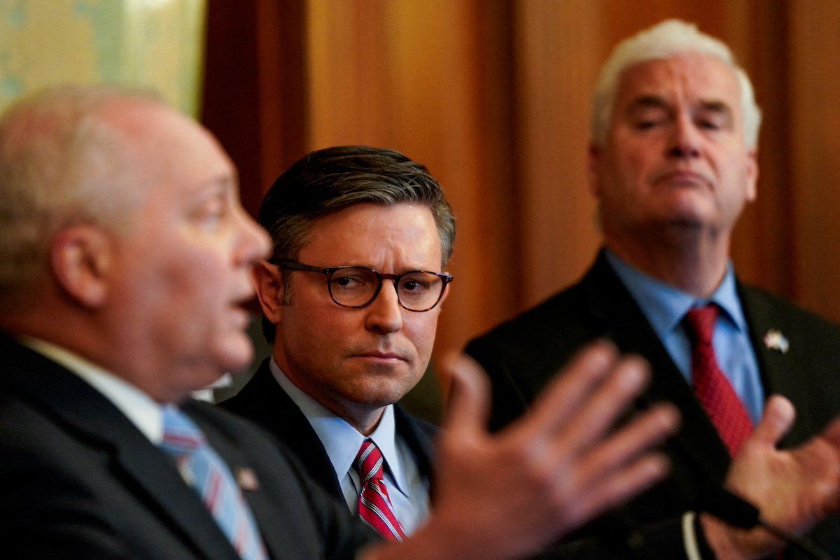 FILE PHOTO: U.S. House Speaker Mike Johnson (R-LA) and U.S. Representative Tom Emmer (R-MN) listen as U.S. House Minority Whip Steve Scalise (R-LA) speaks during a press conference about an impeachment inquiry into U.S. President Joe Biden at the U.S. Capitol in Washington, U.S., November 29, 2023.