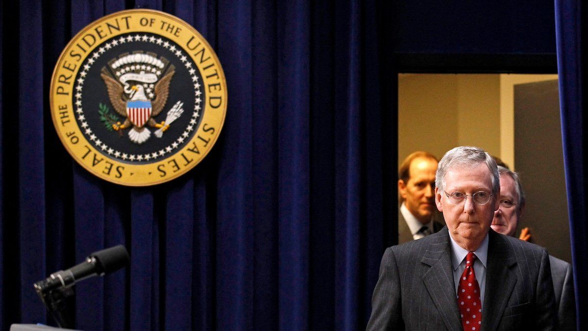 ​FILE PHOTO: U.S. Senate Republican leader Mitch McConnell (R-KY) arrives for the signing into law a bill at the Eisenhower Executive Office Building in Washington, December 17, 2010. 