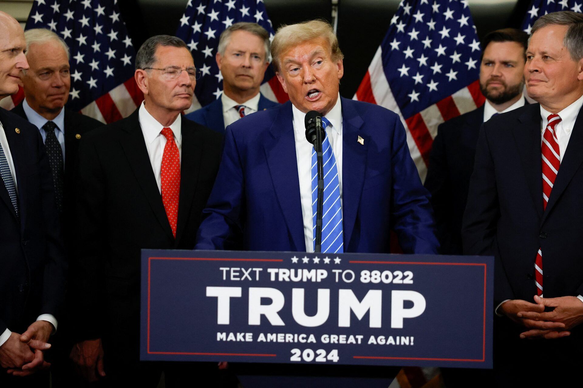 Former U.S. President and Republican presidential candidate Donald Trump speaks to the media following meetings with Republicans on Capitol Hill, at the National Republican Senatorial Committee (NRSC) headquarters in Washington, U.S., June 13, 2024. 