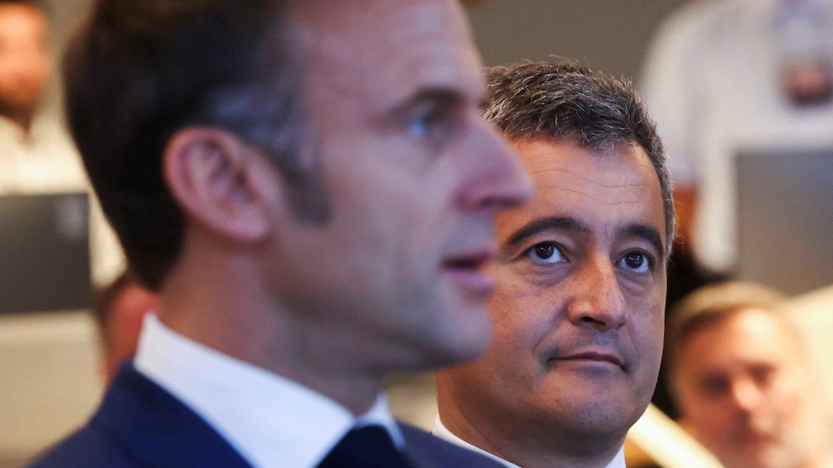 French Interior Minister Gerald Darmanin looks on as French President Emmanuel Macron speaks, during a meeting with police forces, during the 2024 Paris Olympic Games in Paris, France, July 27, 2024.