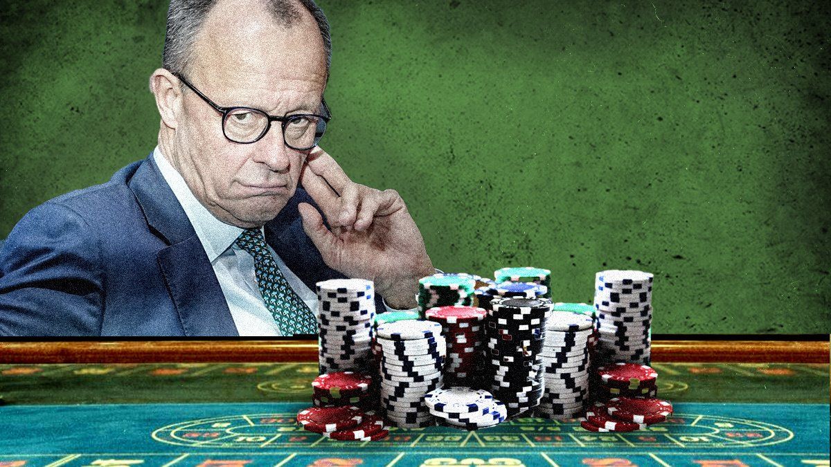 ​Germany’s Friedrich Merz in front of poker table.