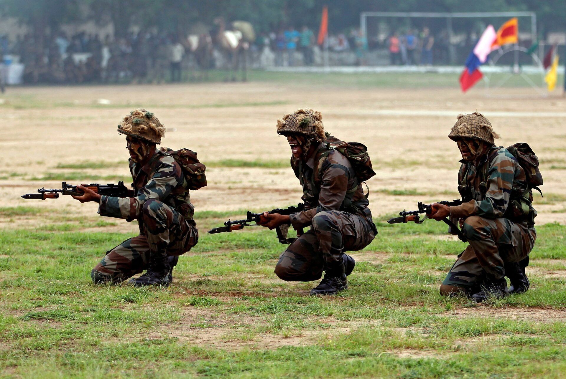 Indian Army soldiers participate in a war exercise during a two-day "Know Your Army" exhibition in Ahmedabad, India, August 19, 2016. 