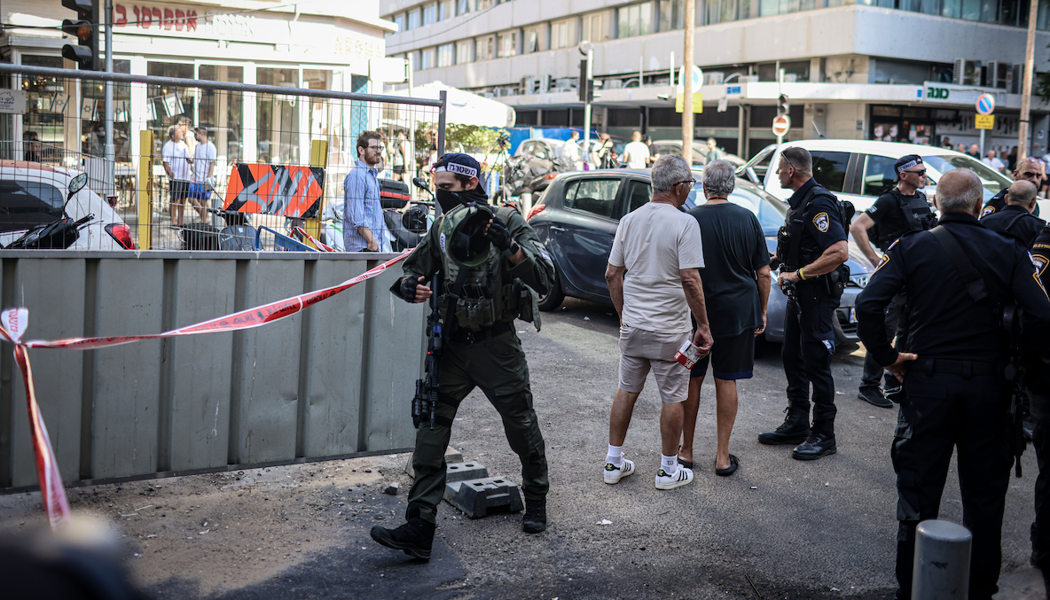 ​Israeli police search the scene of an explosion near a branch of the US embassy in Tel Aviv early Friday.