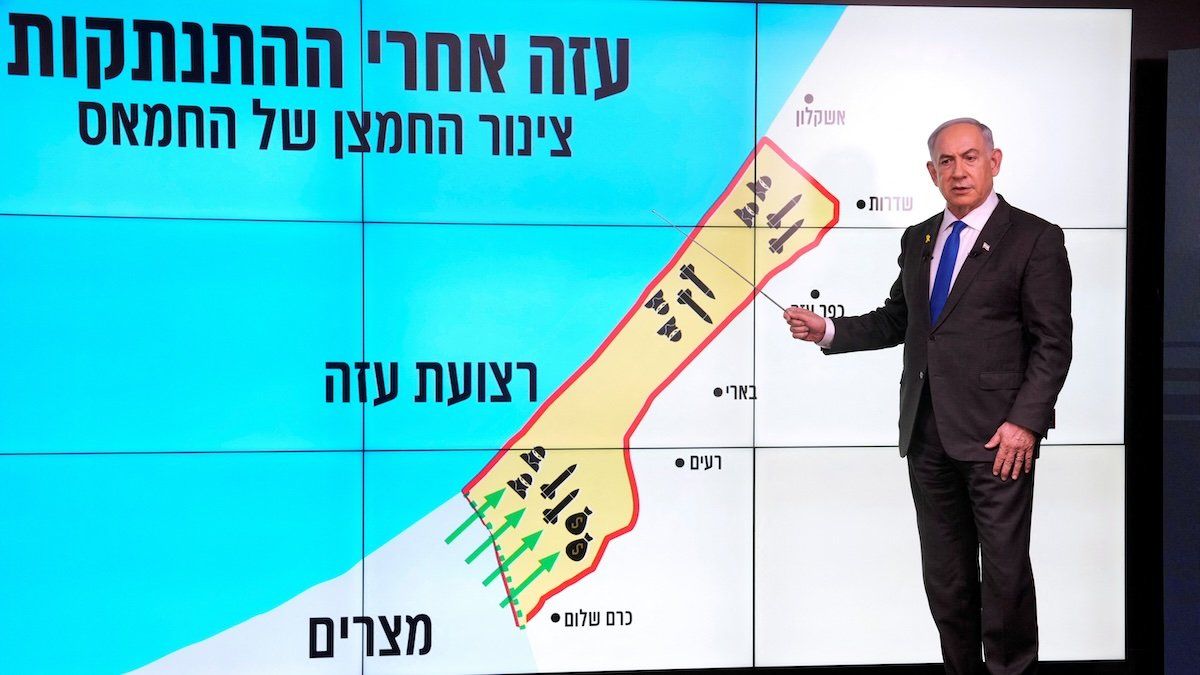 Israeli Prime Minister Benjamin Netanyahu stands before a map of the Gaza Strip, telling viewers how Hamas has imported arms into the territory since Israel's withdrawal in 2005, during a news conference in Jerusalem, September 2, 2024.