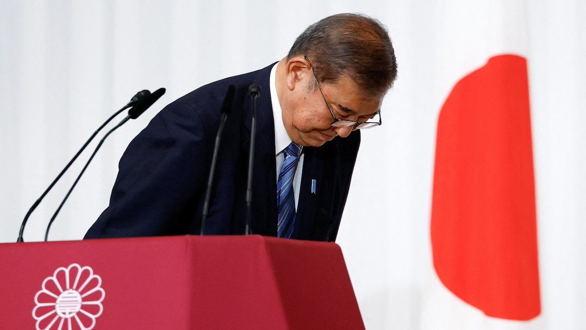 ​Japanese Prime Minister and leader of the ruling Liberal Democratic Party (LDP) Shigeru Ishiba bows to LDP lawmakers onstage after a press conference, a day after Japan's lower house election, at the party's headquarters in Tokyo, Japan October 28, 2024. 