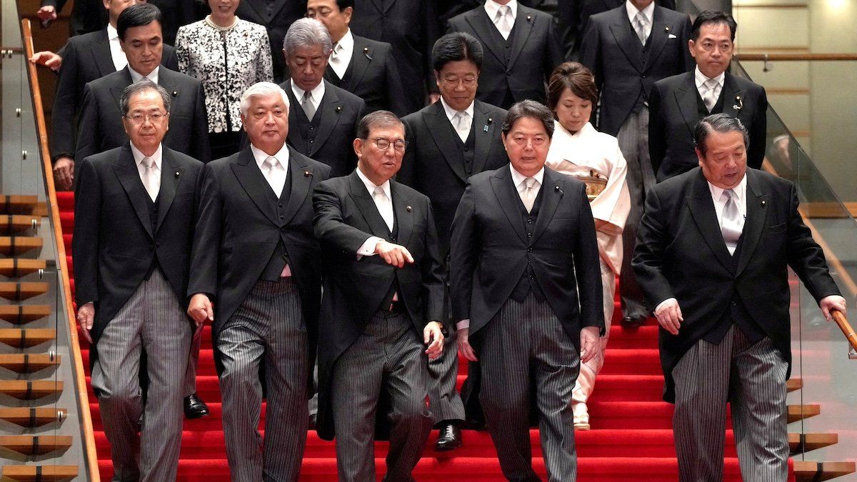 ​Japan's Prime Minister Shigeru Ishiba arrives for a group photograph with his new cabinet members at the prime minister's official residence in Tokyo, Japan, October 1, 2024. 