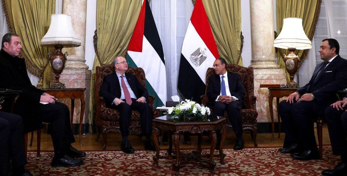 Egypt's Foreign Minister Badr Abdelatty meets with Palestinian Prime Minister Mohammad Mustafa at Al Tahrir palace in Cairo