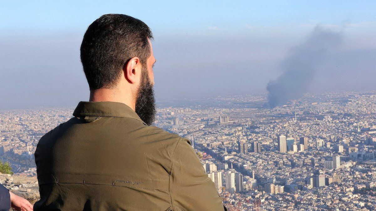 ​HTS leader Ahmed Al-Shara, aka Abu Muhammad Al-Golani, overlooks Damascus, Syria, after the overthrow of Bashar Assad on Dec. 8, 2024. 