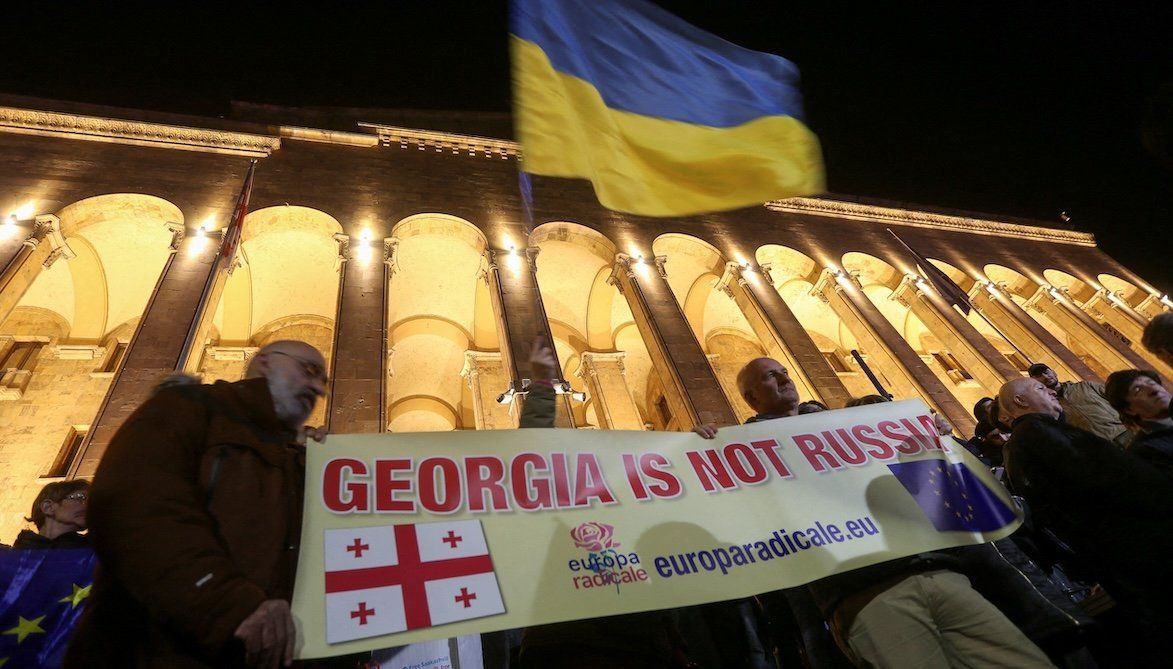 ​Protesters, including supporters of Georgia's opposition parties, hold a rally to dispute the Georgian Dream's declared victory in the weekend's parliamentary election in Tbilisi, Georgia, on Oct. 28, 2024.