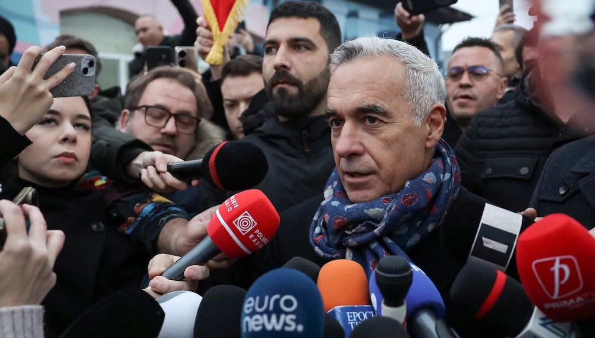 ​Romanian independent far-right presidential candidate Calin Georgescu gives a statement outside his voting station after the annulation of the presidential elections, in Mogosoaia, Romania, on Dec. 8, 2024. 