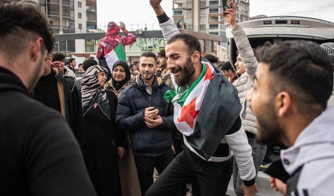 ​Syrian refugees in Ankara, Turkey, celebrate the fall of Syrian President Bashar al-Assad on Dec. 8, 2024.