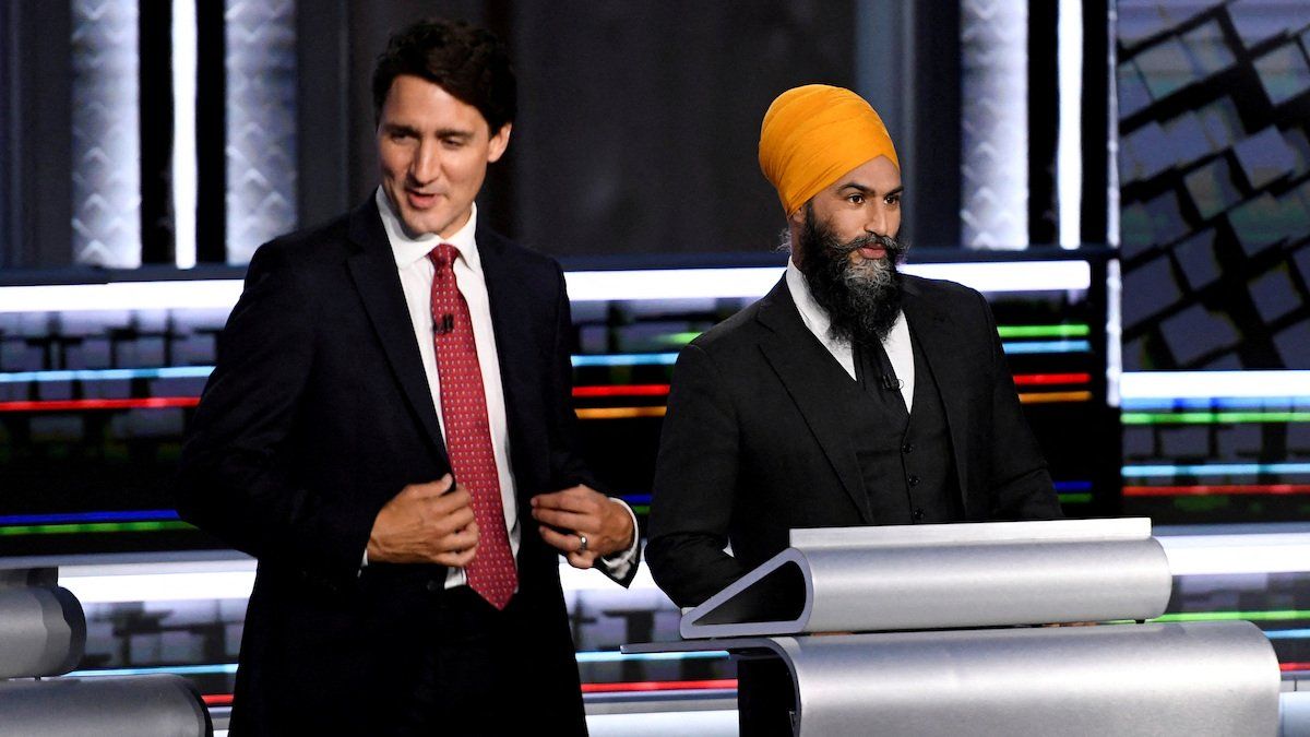 Liberal leader Justin Trudeau and NDP leader Jagmeet Singh take part in the federal election English-language Leaders debate in Gatineau, Canada, September 9, 2021.