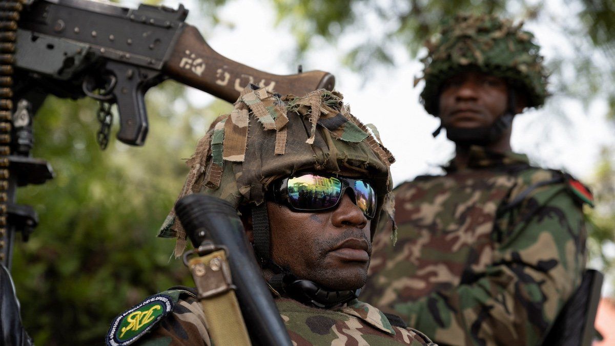 ​Malawi soldiers part of the Southern African Development Community (SADC) military mission for eastern Congo, wait for the ceremony to repatriate the two bodies of South African soldiers killed in the ongoing war between M23 rebels and the Congolese army in Goma, North Kivu province of the Democratic Republic of Congo February 20, 2024. 