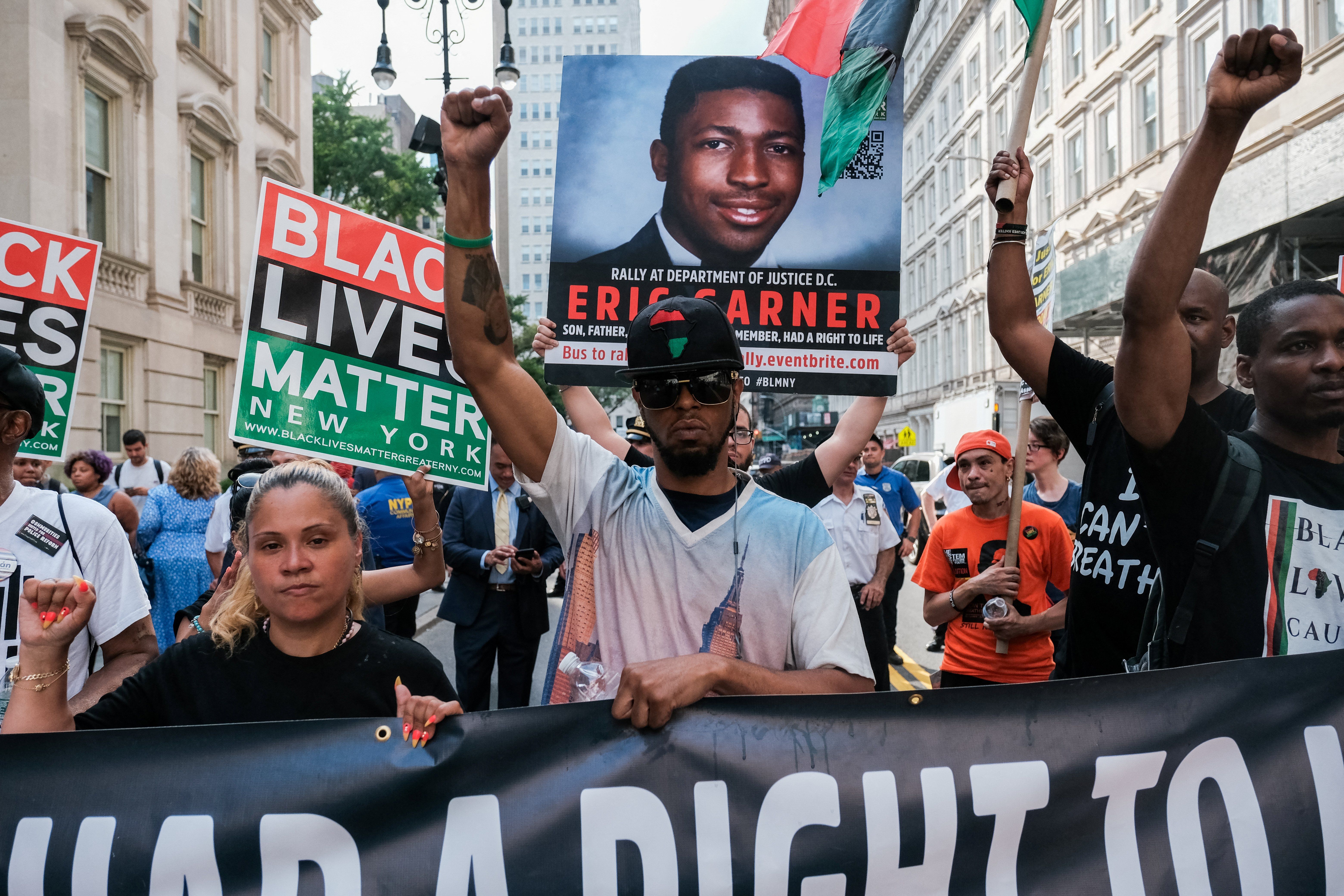 Members of Black Lives Matter protest on the fifth anniversary of the death of Eric Garner, a day after federal prosecutors announced their decision not to prosecute NYPD officer Daniel Pantaleo or other officers for charges related to his death, in New York, U.S., July 17, 2019. 