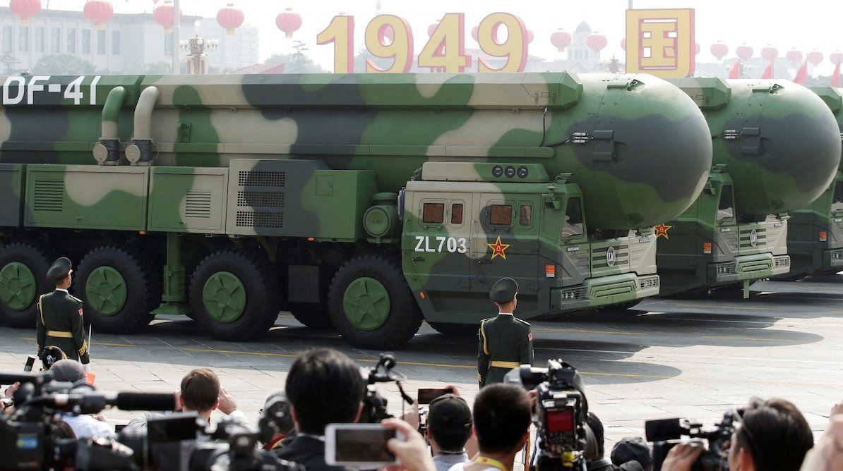 Military vehicles carrying DF-41 intercontinental ballistic missiles travel past Tiananmen Square during the military parade marking the 70th founding anniversary of the People's Republic of China, on its National Day in Beijing, China, on Oct. 1, 2019. 