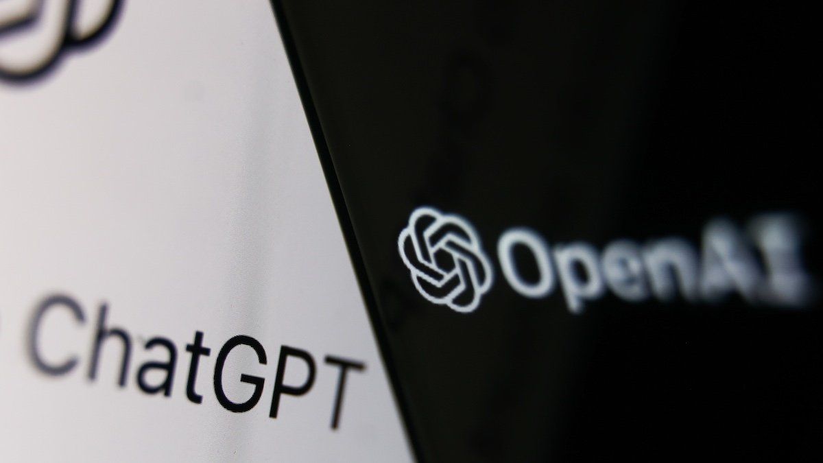 OpenAI logo displayed on a phone screen and ChatGPT website displayed on a laptop screen are seen in this illustration photo taken in Krakow, Poland on December 5, 2022.