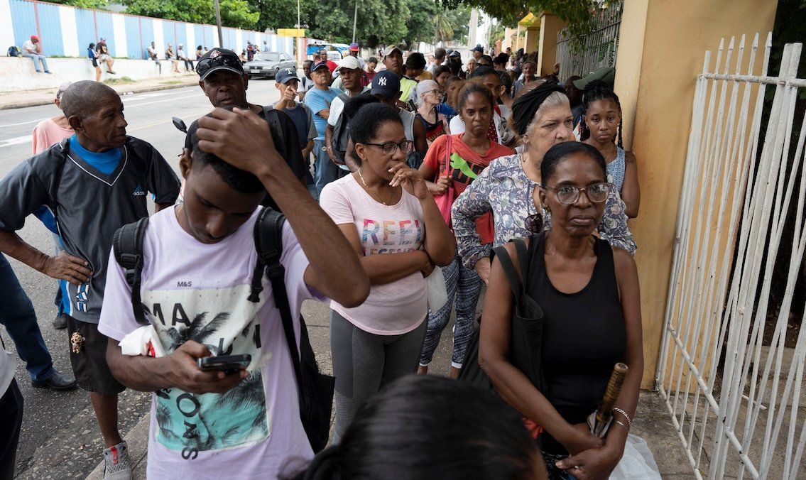 ​People wait in line to buy bread before Rafael's arrival in Havana, Cuba, on Nov. 5, 2024. 