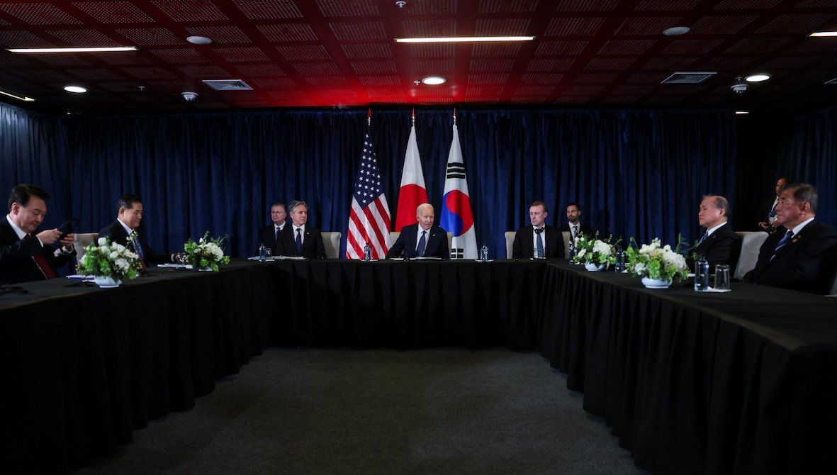 President Joe Biden, South Korea's President Yoon Suk Yeol, and Japan's Prime Minister Shigeru Ishiba participate in a trilateral meeting at the Asia-Pacific Economic Cooperation summit in Lima, Peru, on Nov. 15, 2024. 