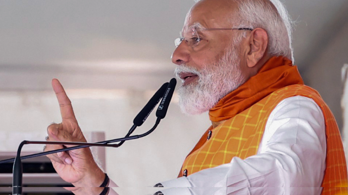 Prime Minister Narendra Modi addresses a public meeting, in Khargone, on Tuesday. 