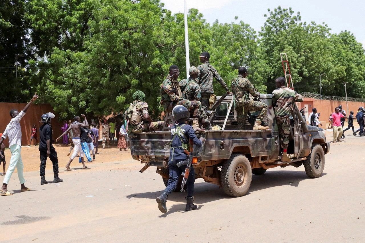 Pro-junta protesters gather outside the French Embassy in Niamey, Niger. 