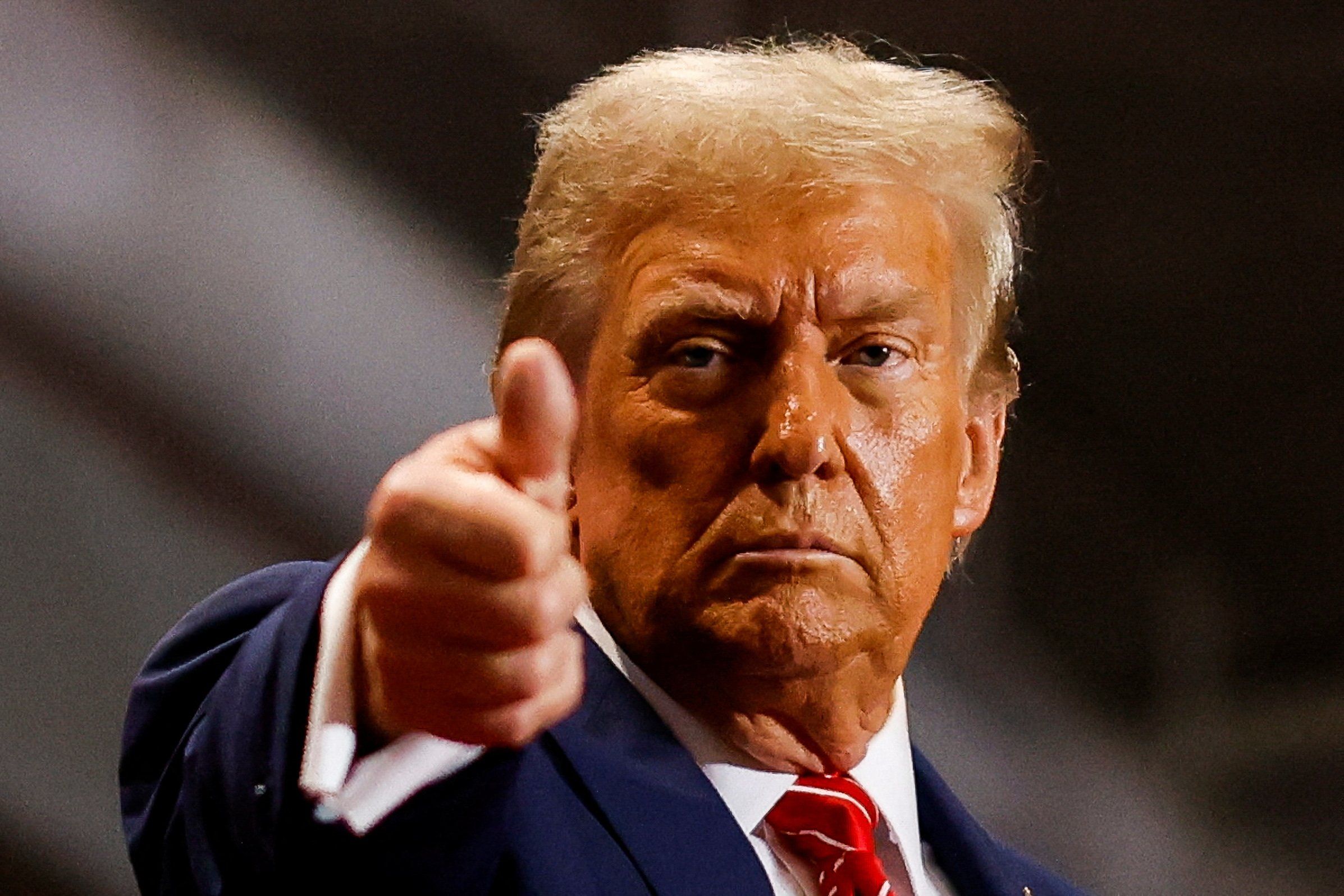 ​Republican presidential nominee and former U.S. President Donald Trump gestures at a campaign rally in Rocky Mount, North Carolina, U.S., October 30, 2024. 