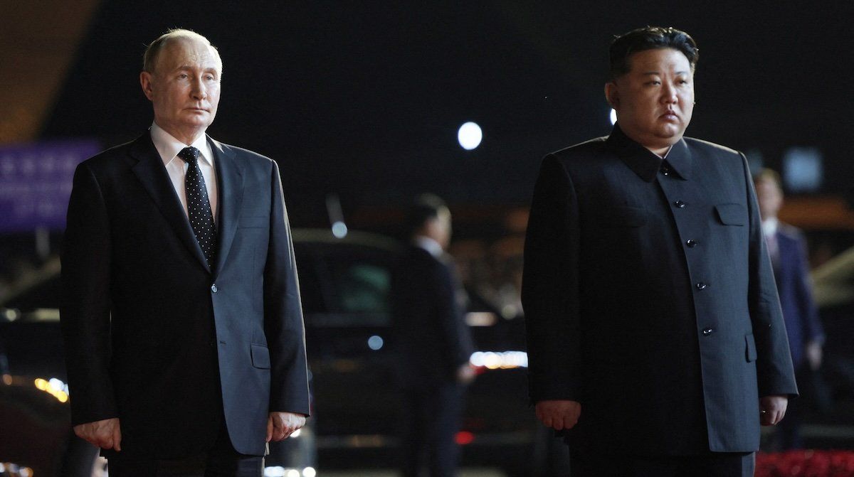 Russia's President Vladimir Putin and North Korea's leader Kim Jong Un attend a farewell ceremony before Putin's departure at an airport in Pyongyang, North Korea June 19, 2024.