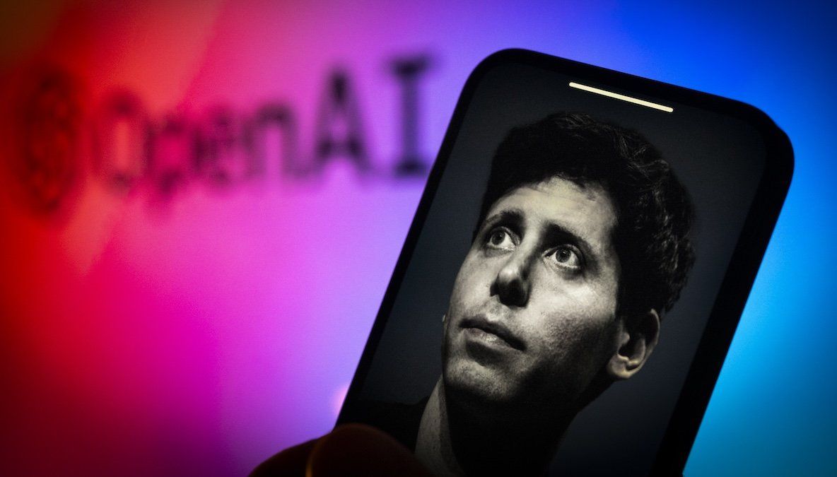 Sam Altman is seen on a mobile device screen next to an OpenAI logo in this illustration.