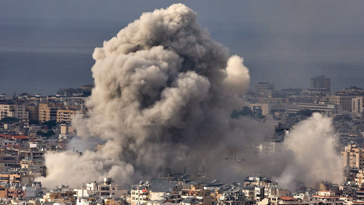 Smoke billows over Beirut's southern suburbs after an Israeli strike, amid hostilities between Hezbollah and Israeli forces, as seen from Baabda, Lebanon, November 25, 2024.