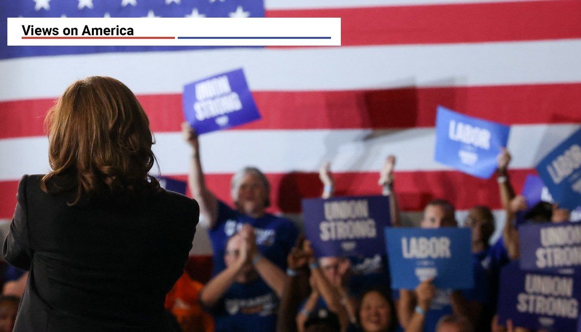 ​Supporters hold placards as Democratic presidential nominee and US Vice President Kamala Harris visits North Western High School in Detroit, Mich., on Sept. 2, 2024.