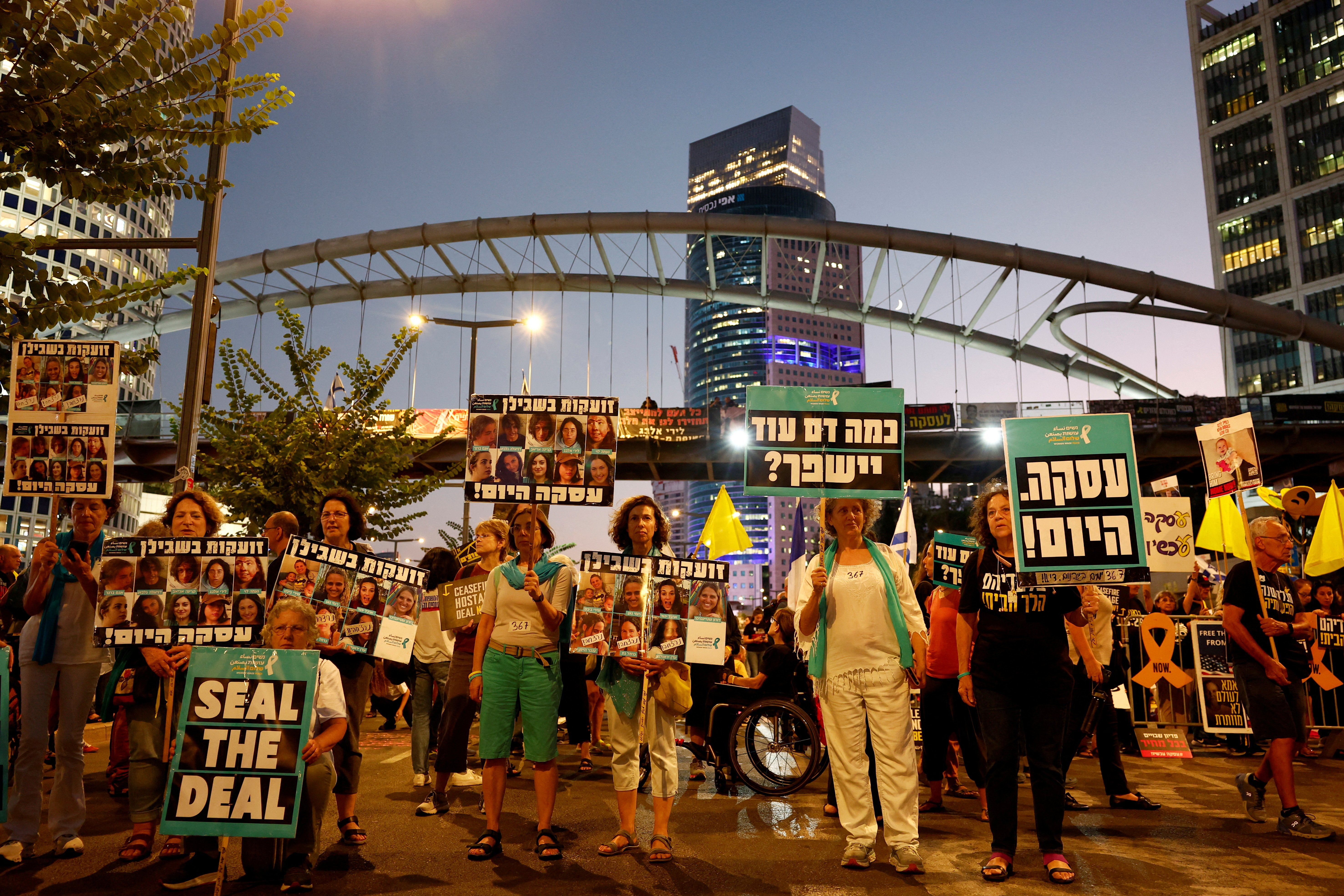 ​The families of hostages held in Gaza hold a silent protest to mark one year since the October 7 attack by Hamas during which their loved ones were taken hostage, in Tel Aviv, Israel, October 7, 2024. 