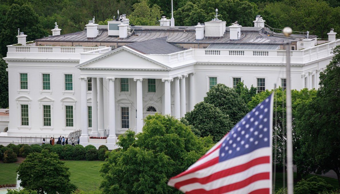 ​The White House is seen from a nearby building rooftop. 