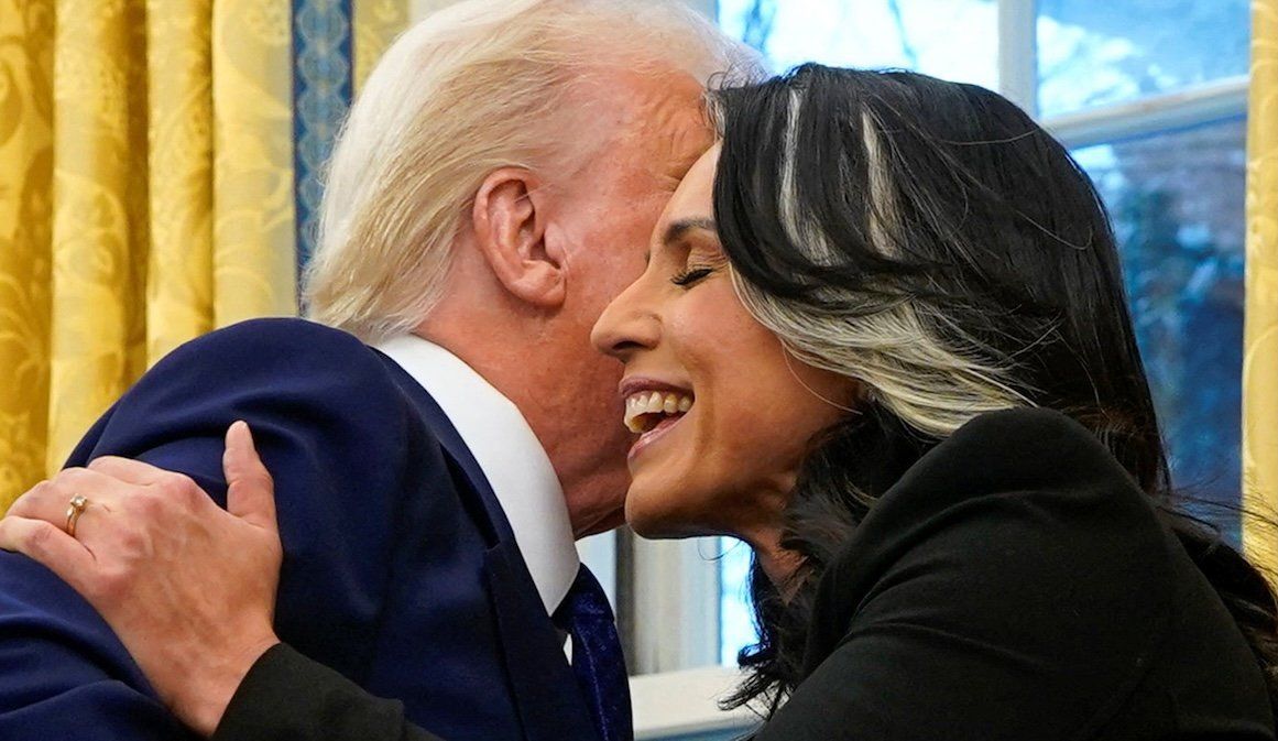 ​Tulsi Gabbard hugs President Donald Trump in the Oval Office at the White House in Washington, D.C., on Feb. 12, 2025. 