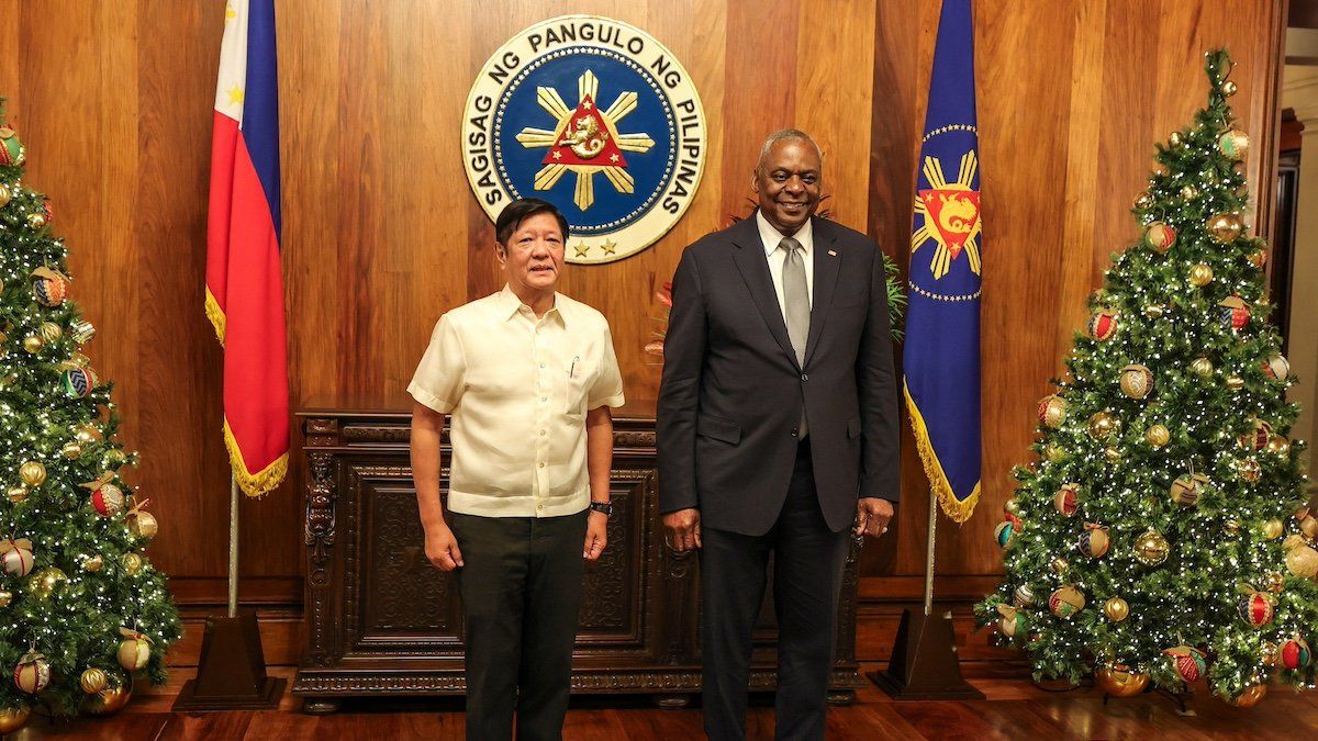 ​U.S. Defense Secretary Lloyd Austin poses with Philippine President Ferdinand Marcos Jr during a courtesy call at the Malacanang Palace in Manila, Philippines, November 18, 2024. 