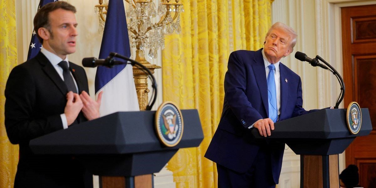 ​U.S. President Donald Trump and French President Emmanuel Macron attend a press conference at the White House in Washington, D.C., U.S., February 24, 2025. 