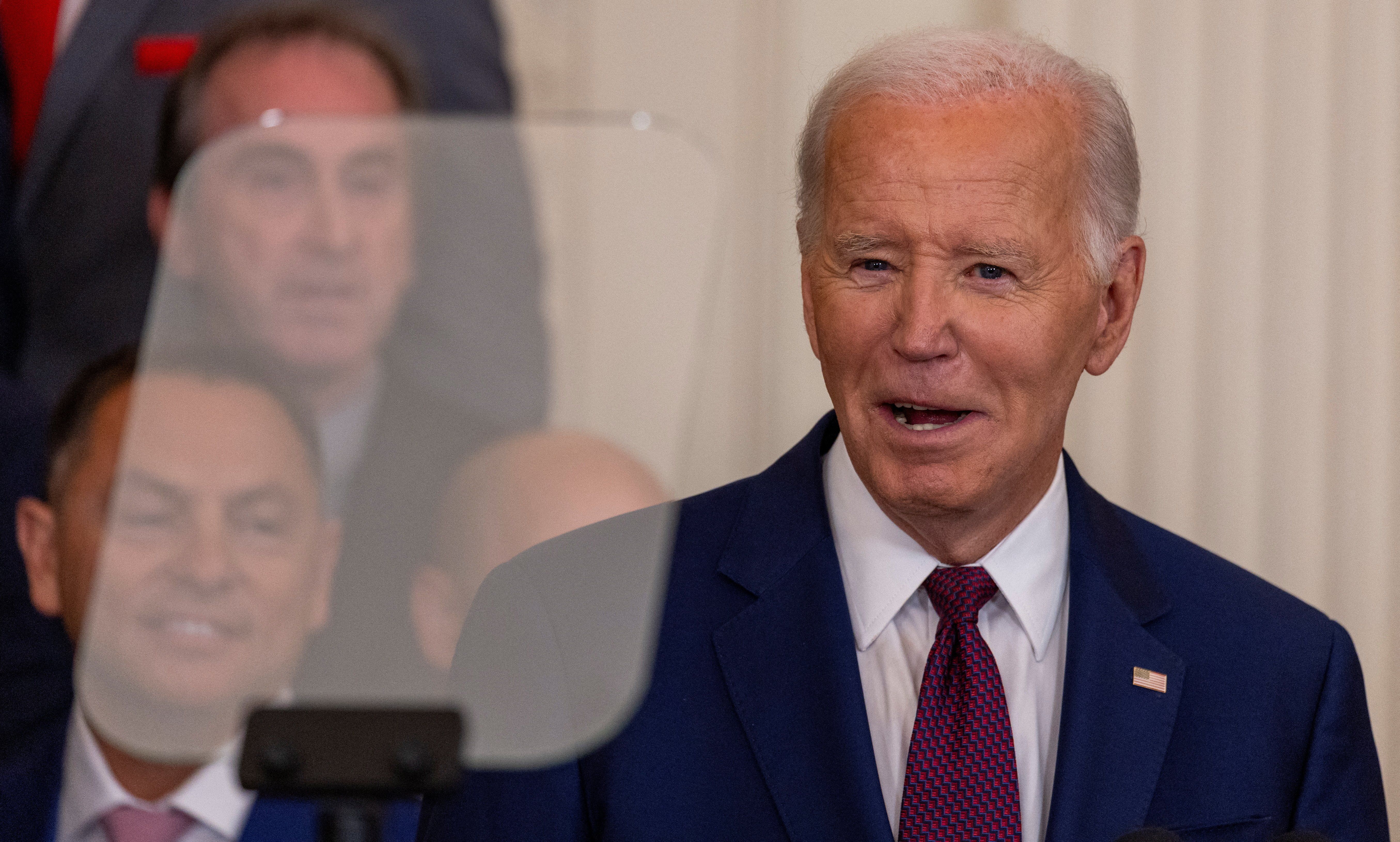 ​U.S. President Joe Biden addresses his guests as he welcomes the 2023 World Series champion Texas Rangers in the East Room at the White House in Washington, U.S., August 8, 2024. 