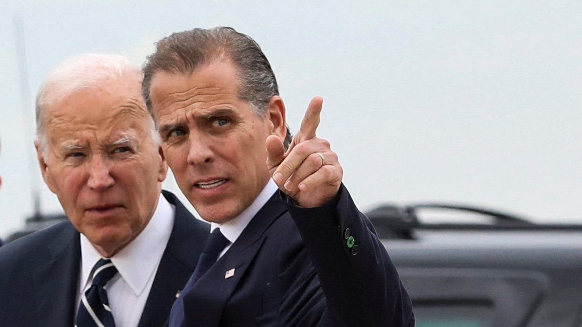 ​U.S. President Joe Biden stands with his son Hunter Biden, who earlier in the day was found guilty on all three counts in his criminal gun charges trial, after President Biden arrived at the Delaware Air National Guard Base in New Castle, Delaware, U.S., June 11, 2024. 