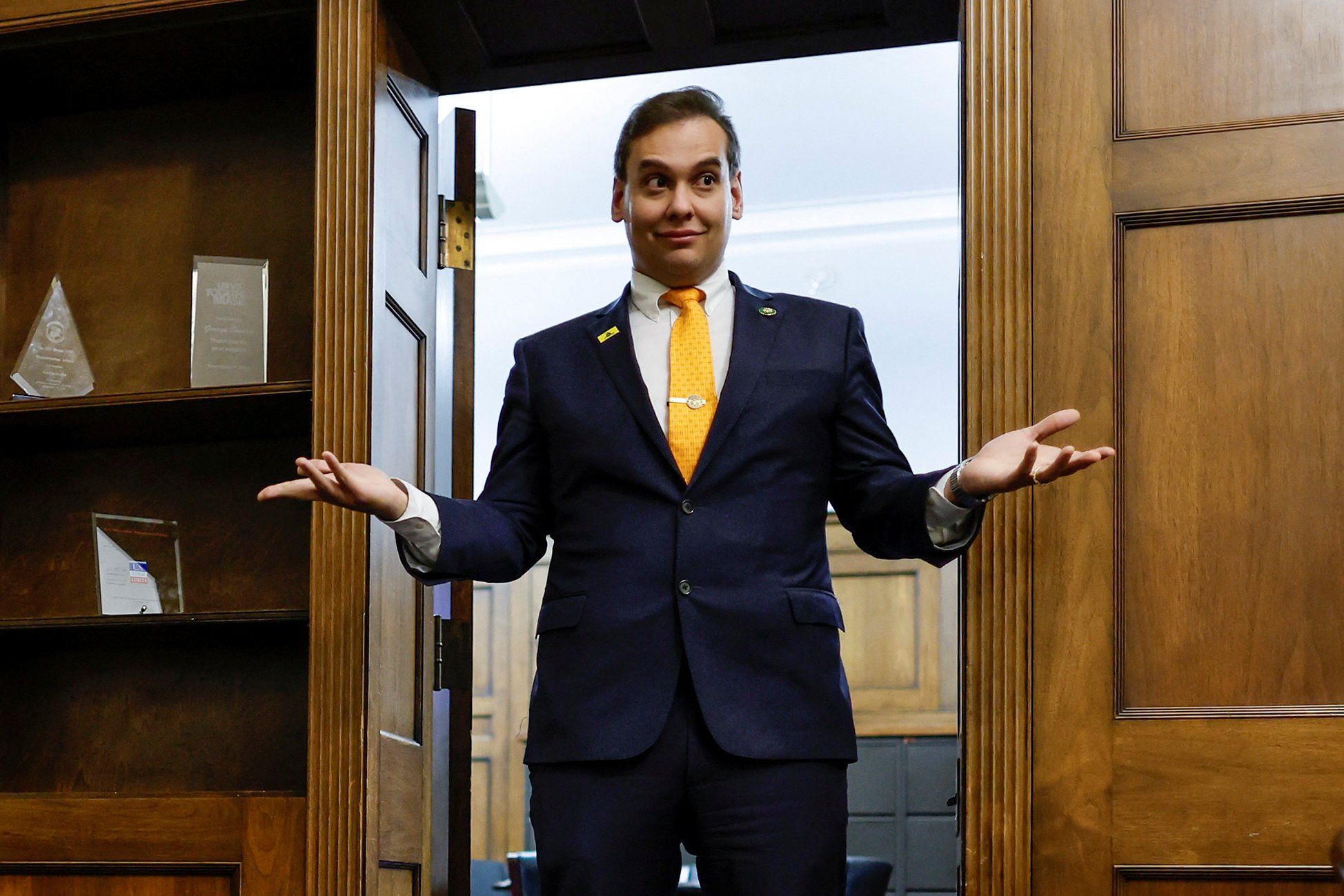 U.S. Representative George Santos (R-NY) chats with his State of the Union guest and members of his staff as they prepare for the evening in Santos’s office on Capitol Hill in Washington, U.S. February 7, 2023.