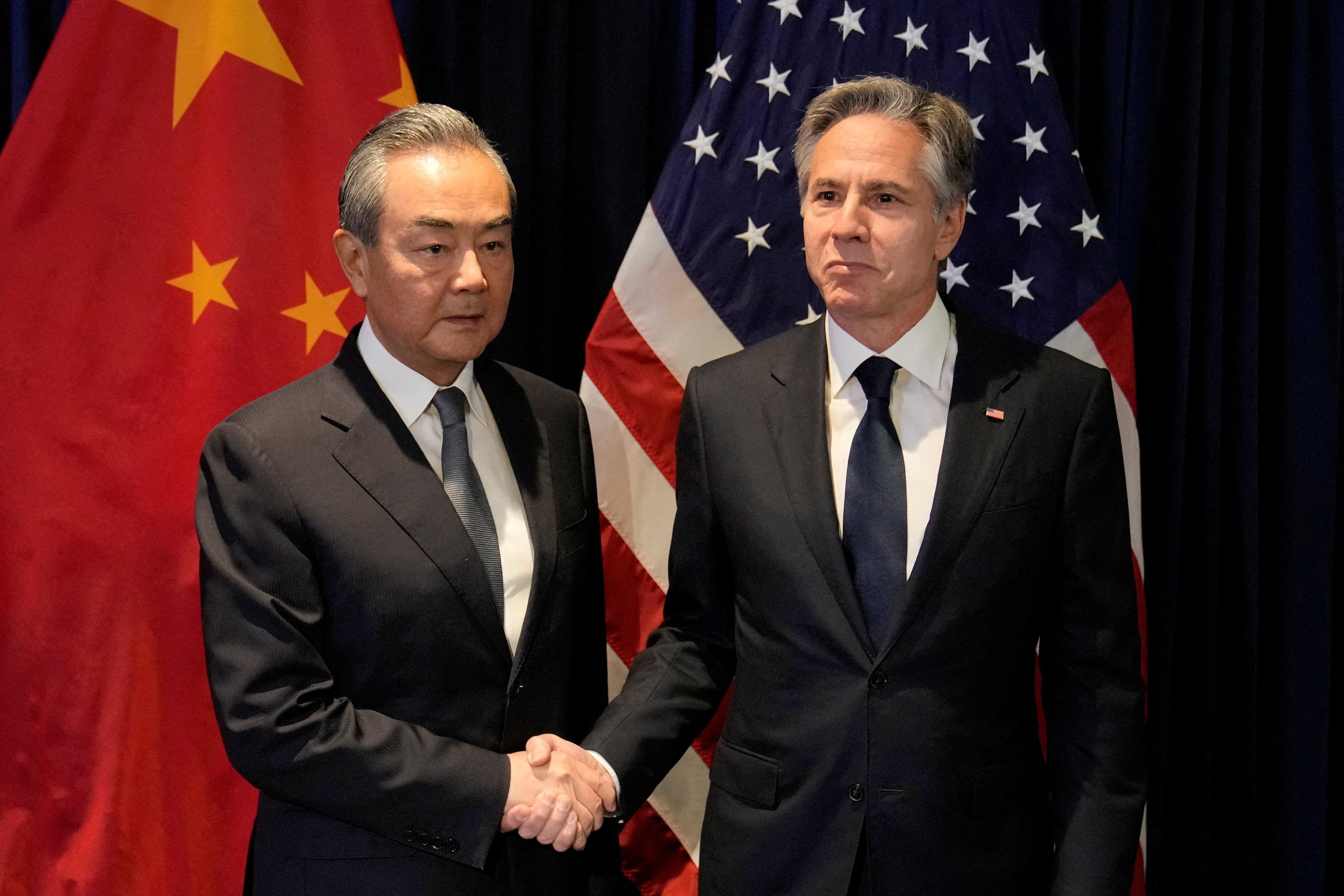 U.S. Secretary of State Antony Blinken shakes hands with Chinese Communist Party's foreign policy chief Wang Yi during their bilateral meeting on the sidelines of the Association of Southeast Asian Nations (ASEAN) Foreign Ministers' Meeting in Jakarta, Indonesia, Thursday, July 13, 2023. 