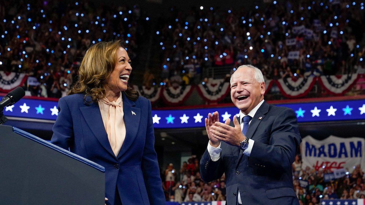 ​U.S. Vice President and Democratic presidential candidate Kamala Harris and her newly chosen vice presidential running mate Minnesota Governor Tim Walz react during a campaign rally in Philadelphia, Pennsylvania, U.S., August 6, 2024. 