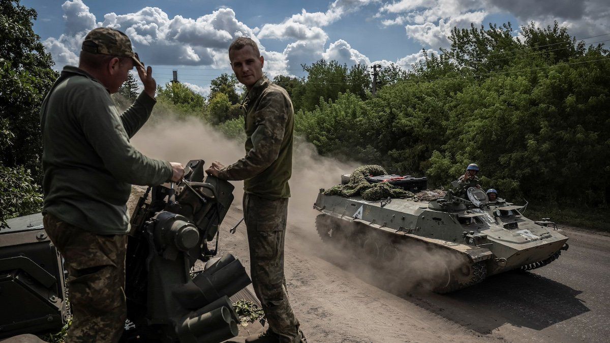 Ukrainian service members ride an Armoured Personnel Carrier, amid Russia's attack on Ukraine, near the Russian border in Sumy region, Ukraine August 11, 2024. 