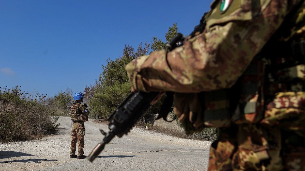 UN Italian peacekeeping soldiers secure an area outside their base in the southern Lebanese border village of Alma al-Shaab.