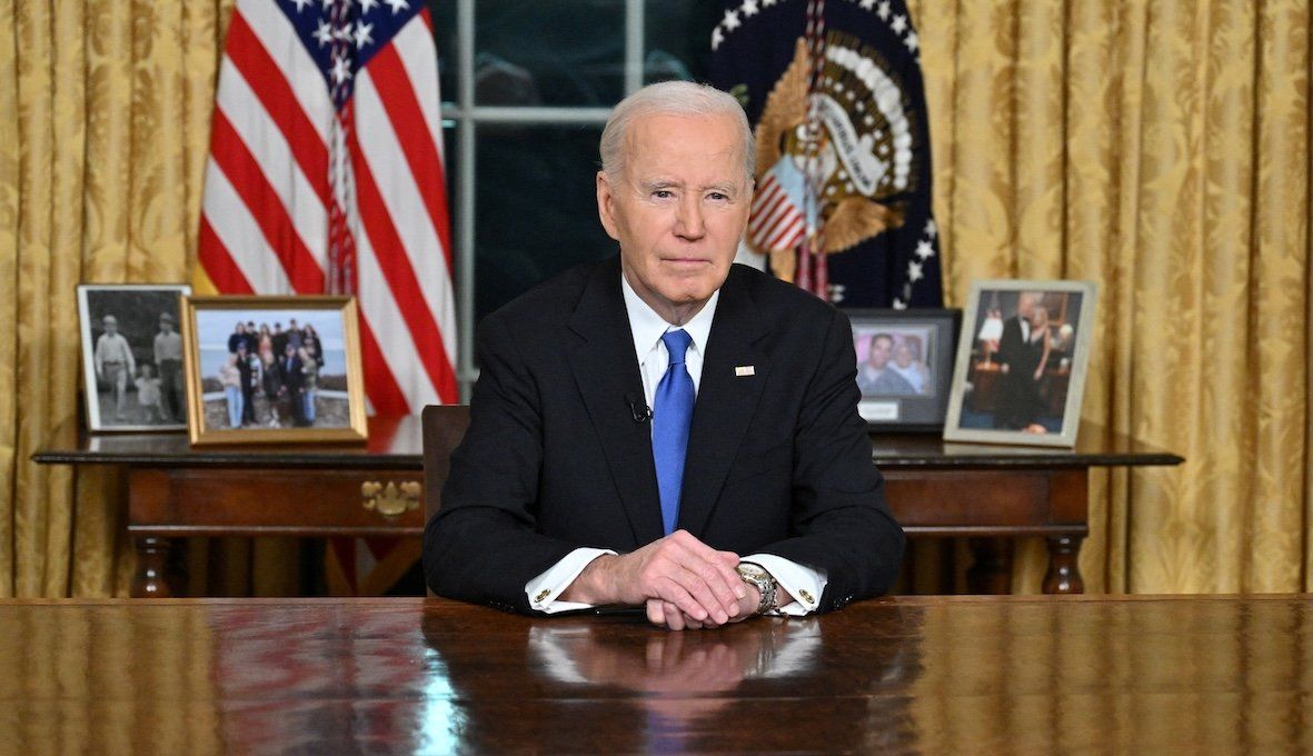 ​US President Joe Biden looks on after he delivered his farewell address to the nation from the Oval Office of the White House in Washington, DC, on Jan. 15, 2025.