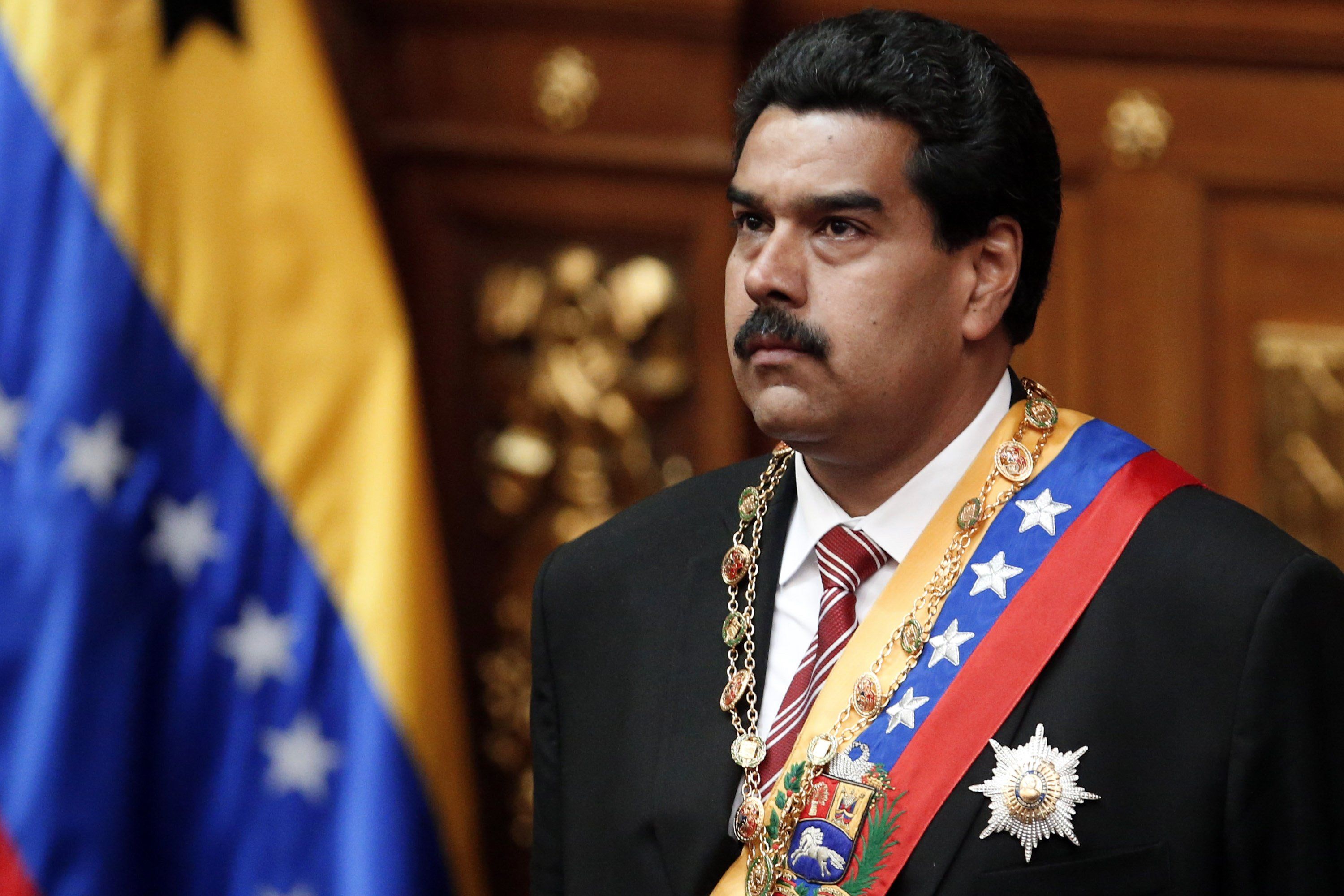 ​Venezuelan Vice President Nicolas Maduro looks on during his swearing-in ceremony as caretaker president following the death of President Hugo Chavez in Caracas March 8, 2013. 