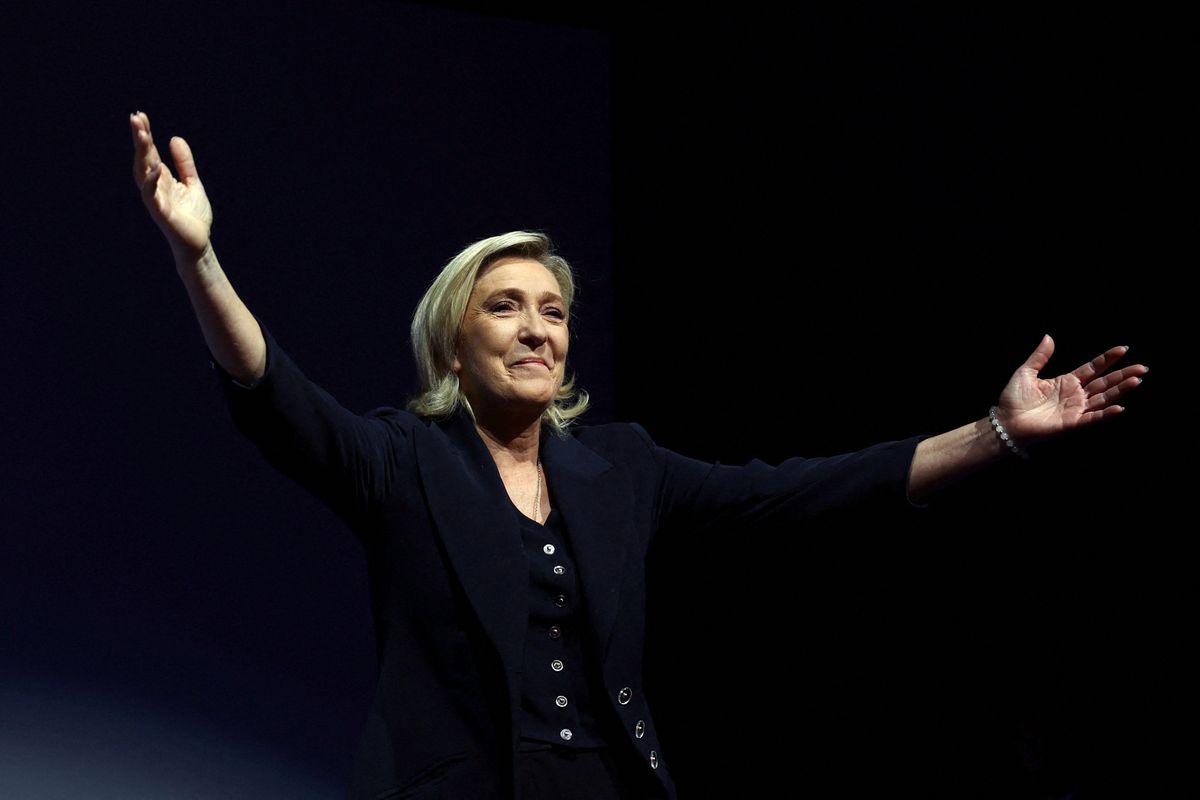 Marine Le Pen, French far-right leader and far-right Rassemblement National (National Rally - RN) party candidate, reacts on stage after partial results in the first round of the early French parliamentary elections in Henin-Beaumont, France, June 30, 2024. 