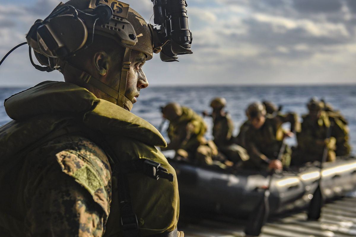 Marines conduct combat rubber raiding craft operations from the well deck of the USS Green Bay in the Philippine Sea, Feb. 6, 2022. The US commander-in-chief said on Feb 22, 2022 he had authorised the movement of additional forces and equipment to bolster NATO allies Estonia, Latvia and Lithuania as Russian troops being ordered to eastern Ukraine following Vladimir Putin recognition of the independence of two separatist regions.