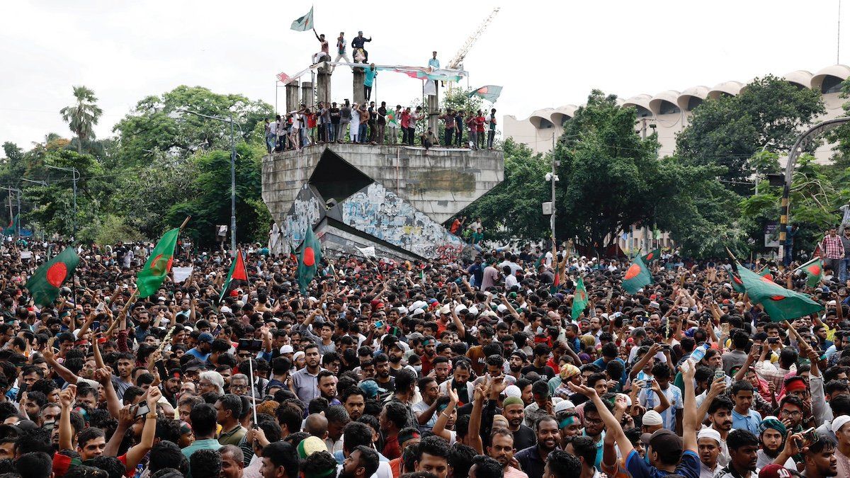 ​People celebrate the resignation of Bangladeshi Prime Minister Sheikh Hasina in Dhaka, Bangladesh, August 5, 2024. 